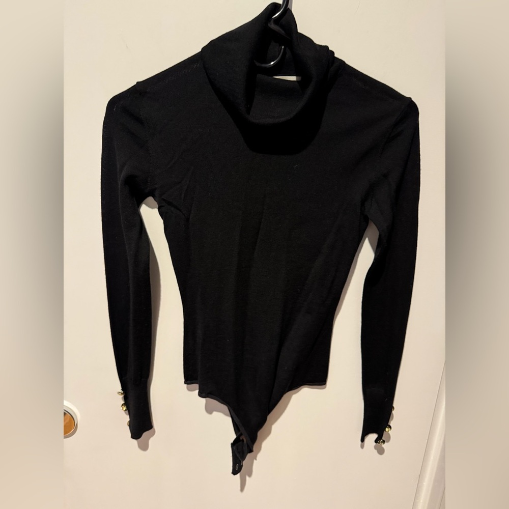 DVF - 100% merino turtleneck bodysuit with buttons on sleeve. Size xxs